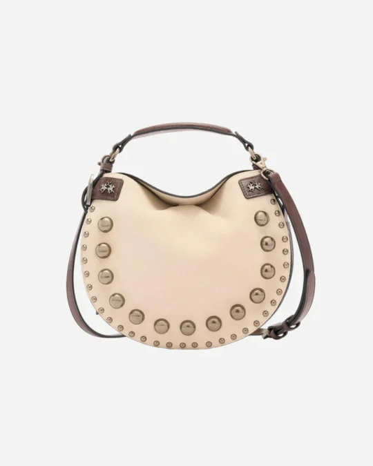 Bolso de media luna de ante con tachuelas decorativas