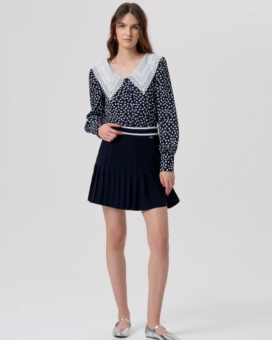 Minifalda de punto acampanada con efecto plisado